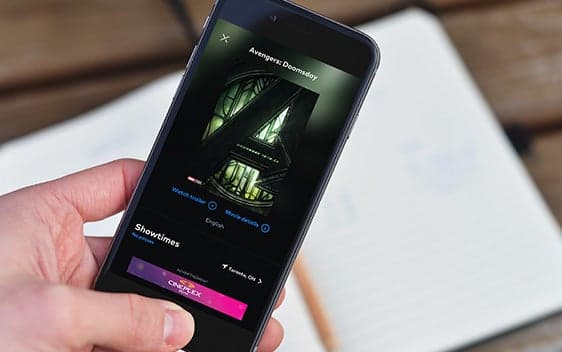 Person watching an Avengers Doomsday advertisement on the Cineplex mobile app
