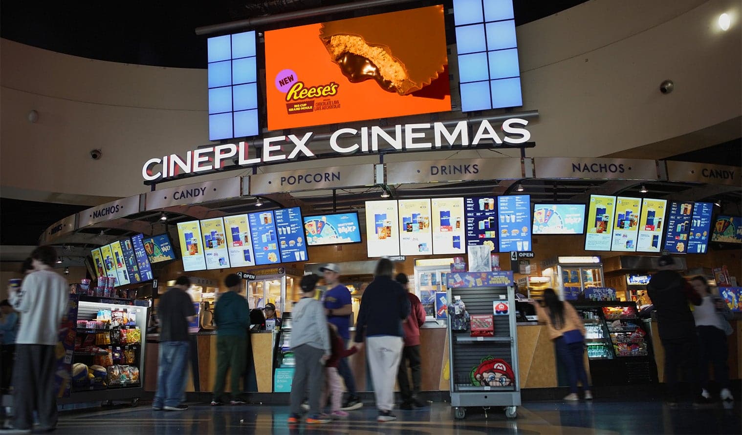 Hershey’s Reese ad displayed above the concession stand at Cineplex Cinemas